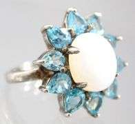 Topaz, Moonstone (both tested),  and Sterling Silver Ring, size 7.