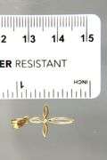 14 KT Gold Cross Pendant, new with tag.    (0.35 gm)