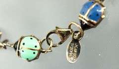 Sterling Silver and 14 KTGF Bracelet of enameled double sided lady bugs, 7"