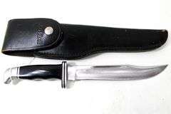 Buck Model 120 fixed blade hunting knife with leather scabbard , Appears to have never been used or resharpened