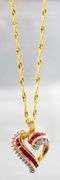 14KT Gold, Diamond, and Ruby (both tested) Pendant and 14KT Gold Necklace.  7gtw.