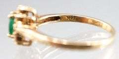 14KT Gold, Diamond, and Emerald (both tested) Ring. 2.2g. Size 7.5.