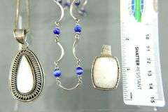 Sterling Silver Necklaces , 18", and Sterling Mother of Pearl Pendants.