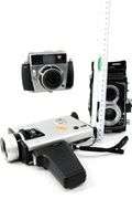 Vintage Cameras:  Baldessamat-F 35mm Film Camera (Made 1958 to 1967) - and - Ricoh Twin Lens Reflex Camera Seikosha-SLV 120 Film - and - Yashica Electro 8 YXL-Zoom 25 Magnetic Release Silent Super 8 (Marketed 1974)