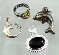 Sterling Silver Dolphin Pendants,  an oval Onyx Sterling Pendant and a Sterling buckle Ring, size 5