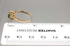 14KT Gold, Diamond, and Emerald (both tested) Ring. 2.2g. Size 7.5.