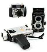 Vintage Cameras:  Baldessamat-F 35mm Film Camera (Made 1958 to 1967) - and - Ricoh Twin Lens Reflex Camera Seikosha-SLV 120 Film - and - Yashica Electro 8 YXL-Zoom 25 Magnetic Release Silent Super 8 (Marketed 1974)