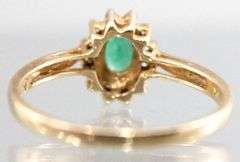 14KT Gold, Diamond, and Emerald (both tested) Ring. 2.2g. Size 7.5.