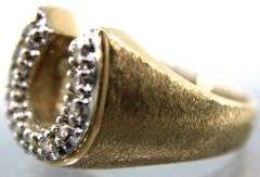 10KT Gold and Diamond (tested) Ring. 7g.  Size 9.5