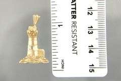 14 KT Gold Lighthouse Pendant.     (1.91 gm)