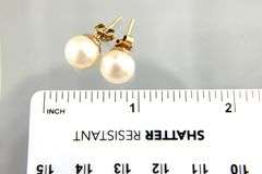 14 KT Gold and Genuine Pearl Earrings.