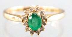14KT Gold, Diamond, and Emerald (both tested) Ring. 2.2g. Size 7.5.