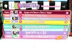 Books:  Dog Man by Dav Pilkey (Multiple Volumes) - and - Unicorn Books by Simpson (Multiple Volumes) - and - More