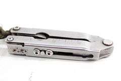 Vintage Gerber Multi tool in leather pouch .