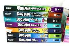 Books:  Dog Man by Dav Pilkey (Multiple Volumes) - and - Unicorn Books by Simpson (Multiple Volumes) - and - More
