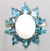 Topaz, Moonstone (both tested),  and Sterling Silver Ring, size 7.