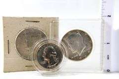 1964 Kennedy silver half dollars and a 1943 Washington Silver Quarter