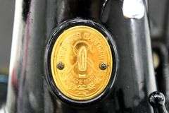1930s/1940s Singer Featherweight. Serial number AF080436. Catalog 3-110 | 700 Black & Gold Sewing Machine with Case, Manual, and Accessories - Consignor contributes last serviced 7/16/2025 "Works Great"
