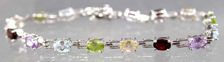 Sterling Silver Tennis Bracelet of multiple Gemstones (all tested), 7", box double safety latch closure, in a gift box.