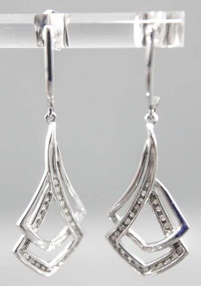 10 KT Gold and Diamond (tested) Earrings. 3.3g