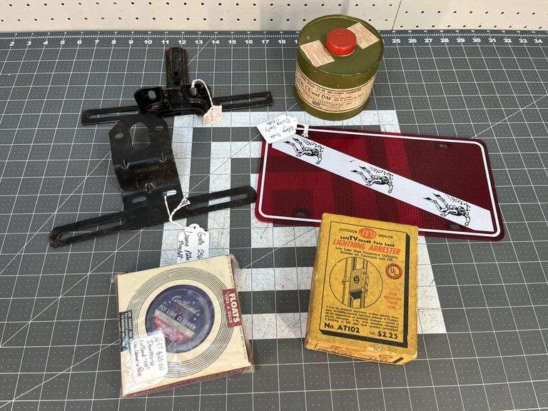 Lightning Arrester, Fly Line Cleaner, License Plate Holders, Gas Mask Canister