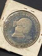 3 Eisenhower Bicentennial Dollar Coins, 1 Half Dollar and 1 1979 Susan B. Anthony