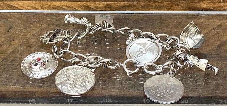 Sterling Silver Charm Bracelet (7 of charms are marked sterling)