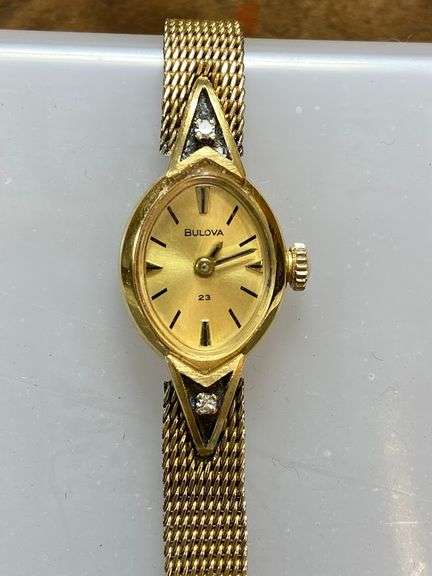 Ladies Bulova Wrist Watch. Marked 14k, GF Band. (ticks a bit but stops - not working)