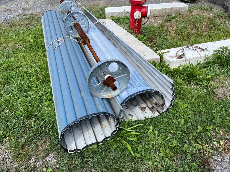 Metal Roll Up Doors from a Storage Unit, no additional hardware is included.