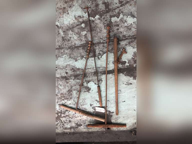 LOG ROLLER, WOODEN HANDLE DRILLS, AND A BRANDING IRON