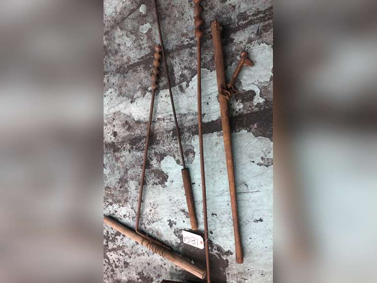 LOG ROLLER, WOODEN HANDLE DRILLS, AND A BRANDING IRON