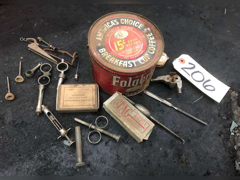 ANTIQUE FOLGERS CAN WITH MISC MEDICAL SYRINGES