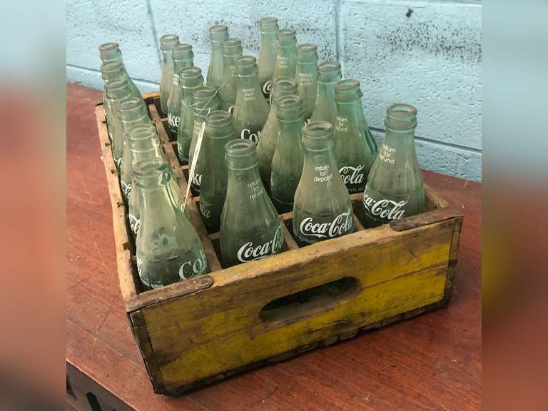 ASSORTED COKE BOTTLES AND CRATE (24 TOTAL)