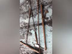 LOG ROLLER, WOODEN HANDLE DRILLS, AND A BRANDING IRON