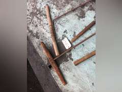 LOG ROLLER, WOODEN HANDLE DRILLS, AND A BRANDING IRON