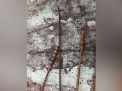 LOG ROLLER, WOODEN HANDLE DRILLS, AND A BRANDING IRON