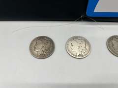 Lot of 4 Morgan Silver Dollar Coins