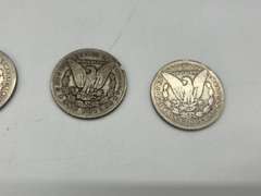 Lot of 4 Morgan Silver Dollar Coins