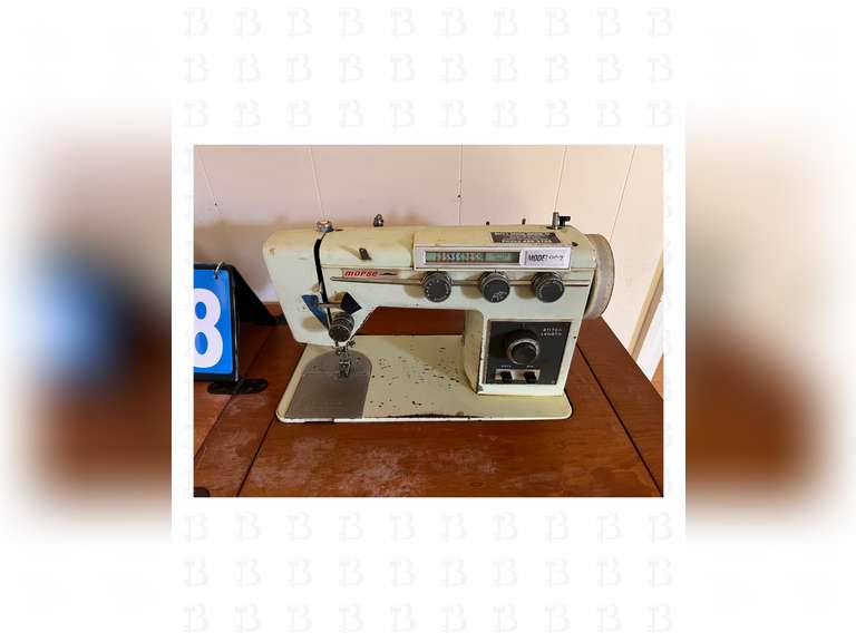 Morse model 902 sewing machine with work table.