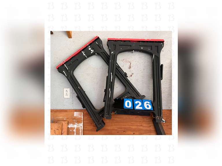 A pair of sawhorses, a 8ft ladder, and construction light with stand.