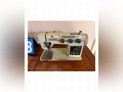 Morse model 902 sewing machine with work table.