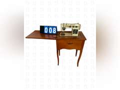 Morse model 902 sewing machine with work table.