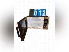 Coffee pot, Toshiba, microwave and trash trashcan