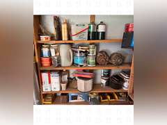 A lot of miscellaneous lubricant, pesticides, chemicals, and hardware. Shelf comes with.