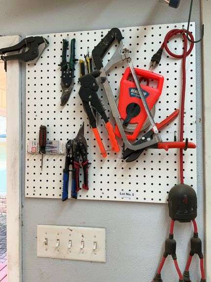 Tools on wall peg board