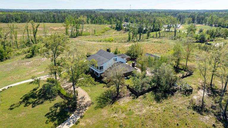 79.978+/- Ac	Estate Home • 5,447 Sq Ft HTD • Pool • I-20 at Exit 108 & Hwy 546 Frontage • 1,038,871 
