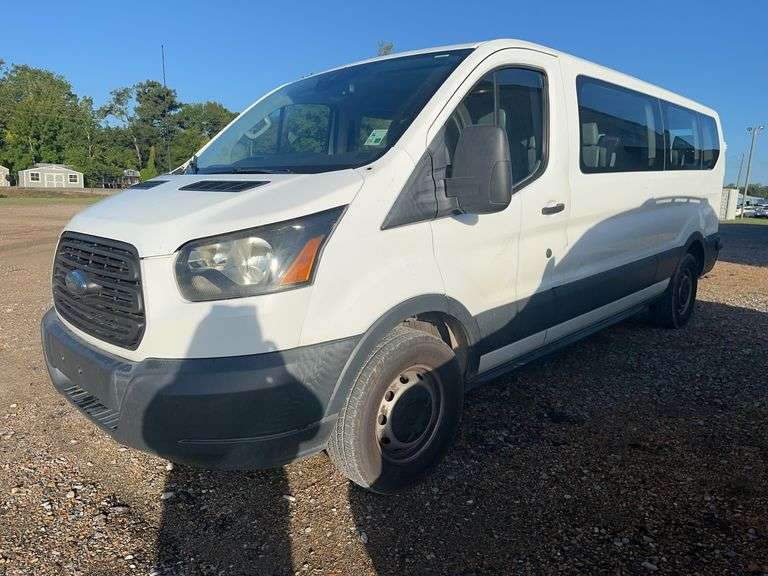 Ford Transit passenger van selling as government surplus at Bonnette Auction Company