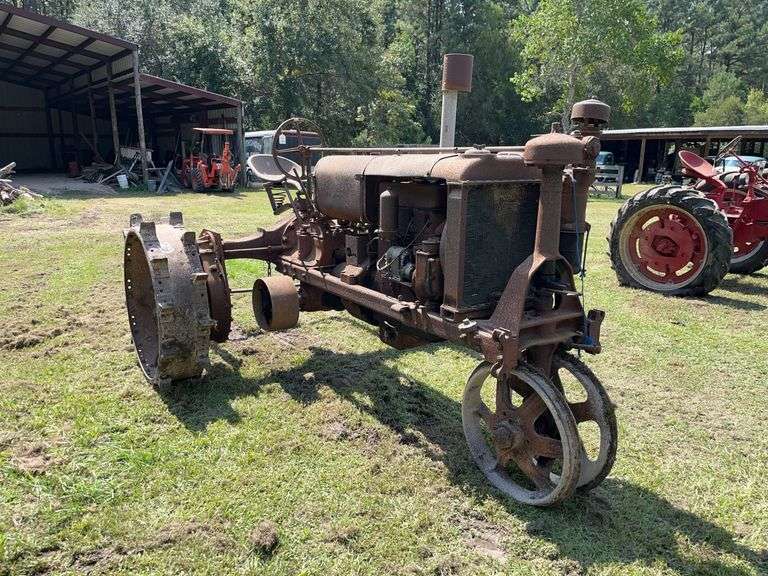 Unrestored steel-wheeled antique tractor ready for restoration, John Borne Estate antique tractor auction