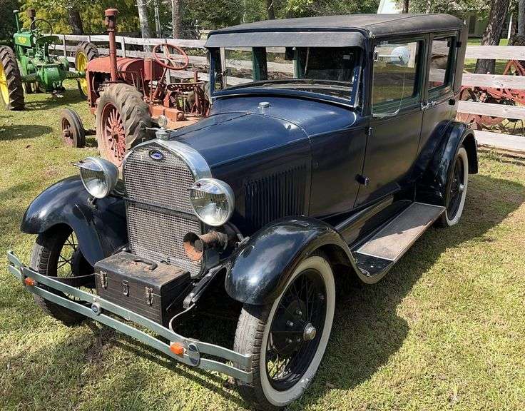 Black 1929 Ford Model A sedan with rear luggage rack and trunk, John Borne Estate auction