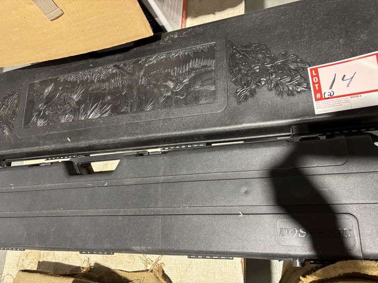 2 – gun cases, one with crack